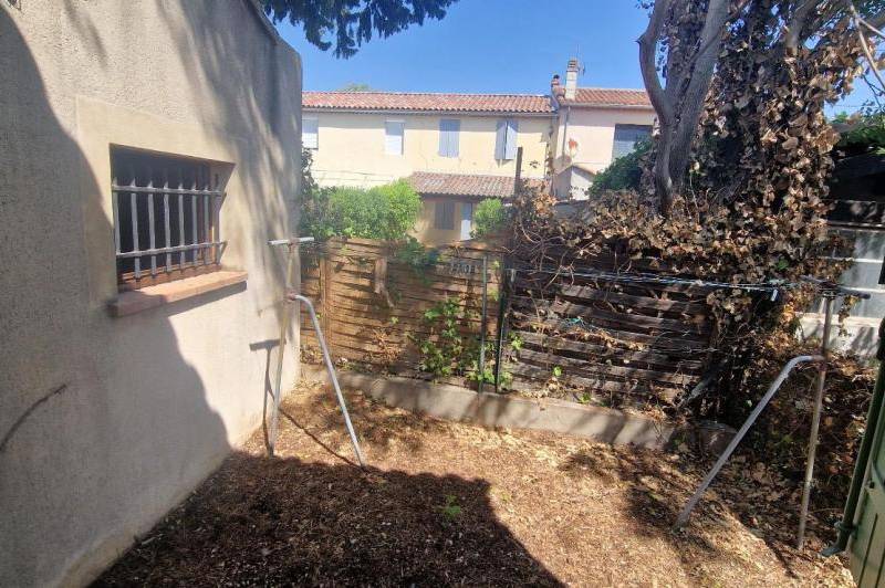 Maison avec jardin + garage  + climatisation  ...
